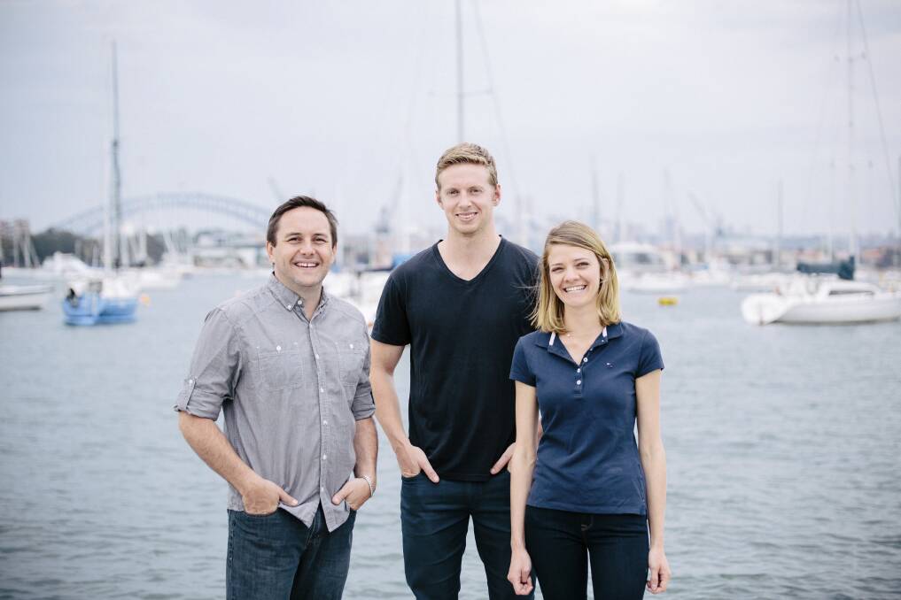 ALL ABOARD: Web developer Ian Belcher with Deckee founder Mike McKeirnan, of Anna Bay, and Jessica Watson.