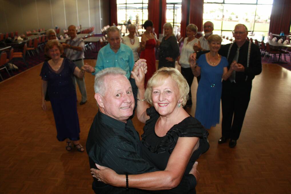 CHEEK TO CHEEK: Ron and Jeanette Marshall with other members of the Soldiers Point Ballroom and New Vogue Dance Group at Soldiers Point Bowling Club. 
