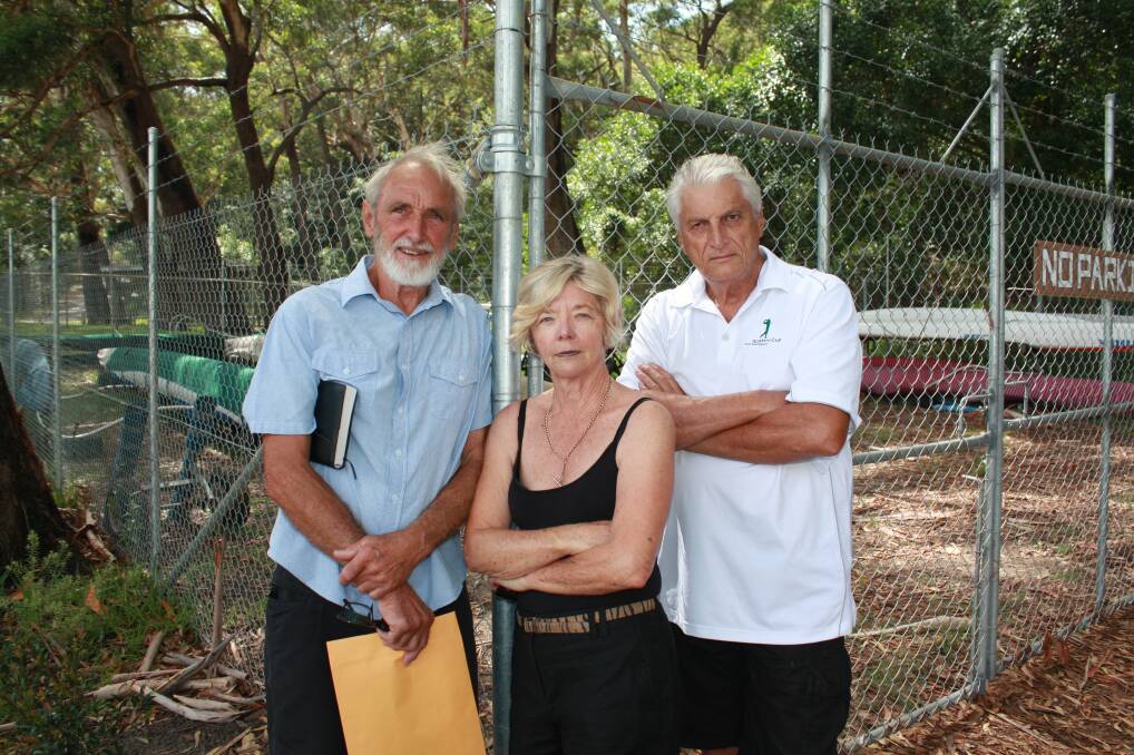 DISAPPOINTED: Shoal Bay Community Association members, from left, Peter Thomas, Roz Welsh and Nigel Dique at the compound. Picture: Stephen Wark