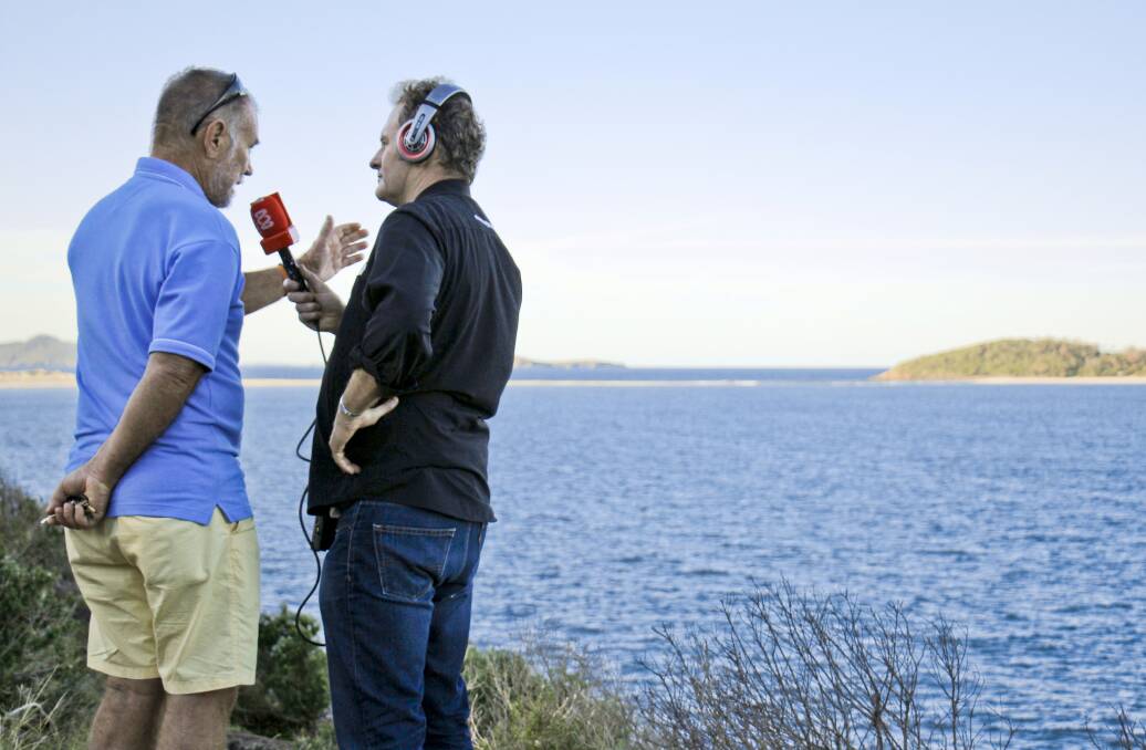 GUIDED TOUR: John "Stinker" Clarke is interviewed by the ABC's Craig Hamilton. Picture: Sophie Brown