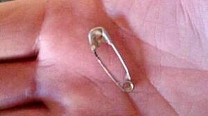 Patrick McMullen found a similar safety pin to this one in a block of Woolworths cheese.