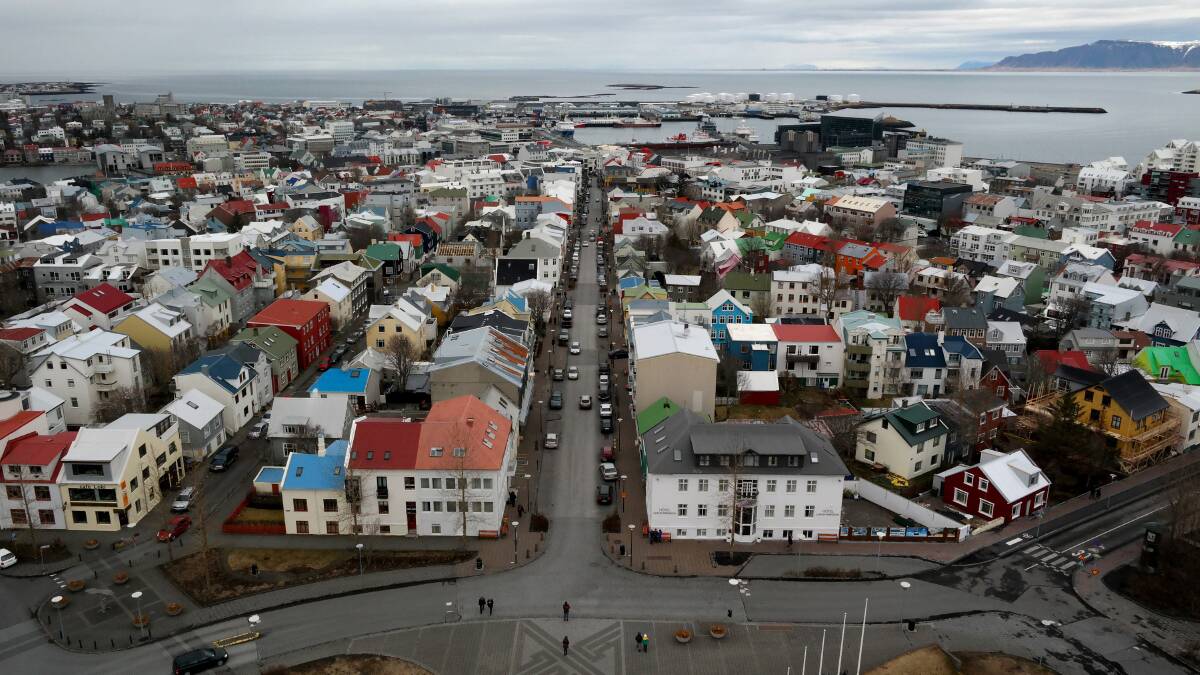 Traffic moves around the buildings in the Icelandic capital is seen from the top of the Hallgrimskirkja tower on April 7, 2014 in Reykjavik, Iceland. Pic: Getty Images