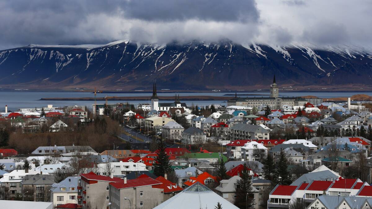 Snow remains on the top of mountains overlooking the Icelandic capital of Reykjavik on April 7, 2014 in Reykjavik, Iceland. Pic: Getty Images