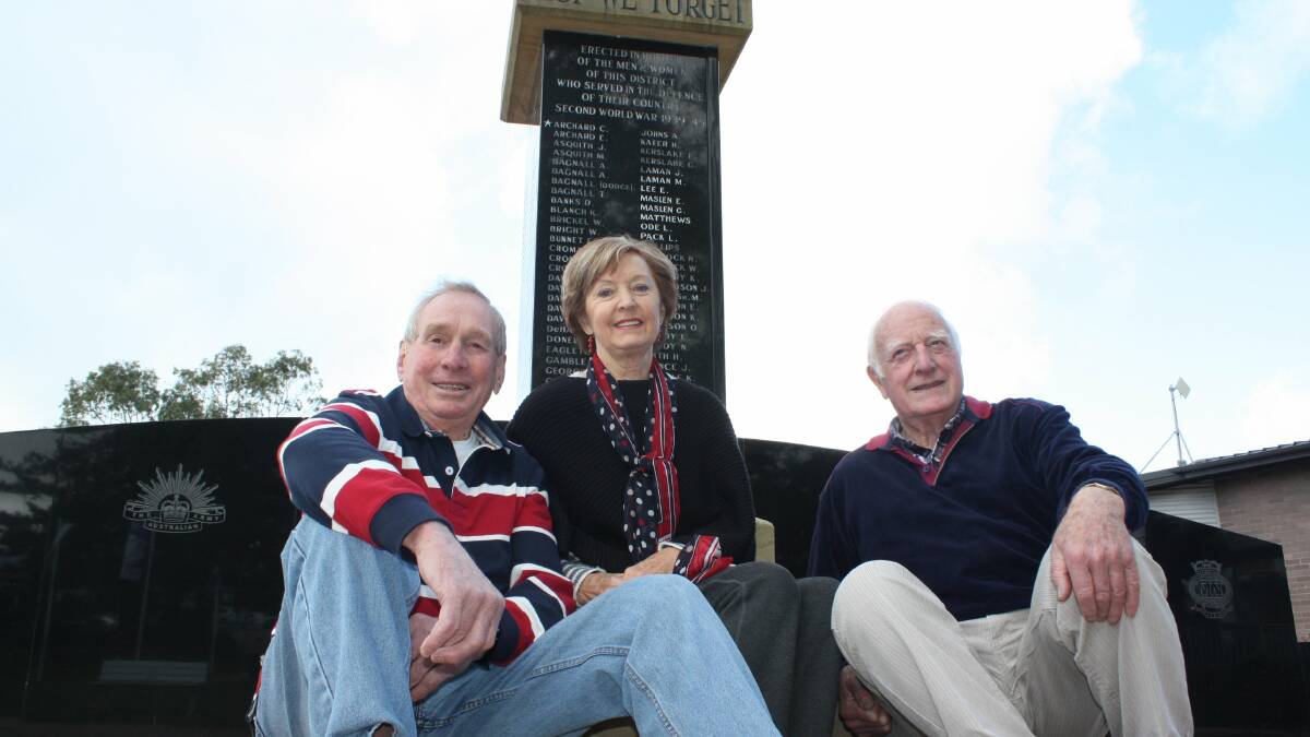 IN SONG: Legatee John Warran, SeaSide Singers member Diana Souter and Vic Marden, at Nelson Bay war memorial, are getting ready for I Remember. Picture: Stephen Wark