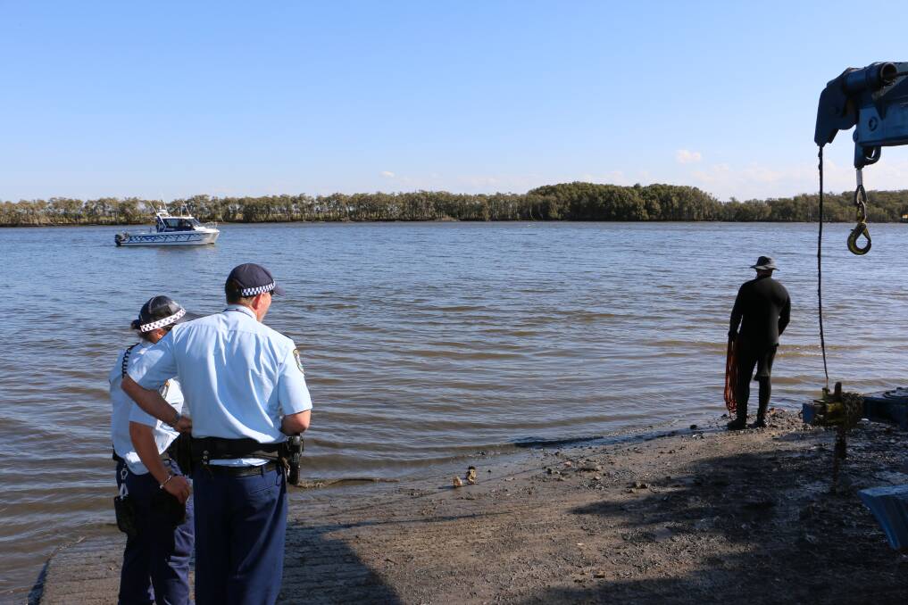 Police from Operation Ahoy recovered four from 14 cars found dumped in the Hunter River at Tomago on Tuesday. Pictures: Ellie-Marie Watts.