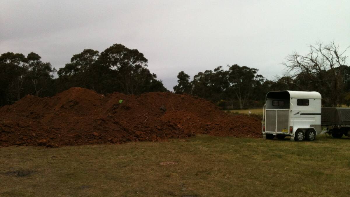 STOCKPILED: Dirt piles at the Bruce MacKenzie Complex in Salt Ash have now been fenced off. Picture: Supplied.
