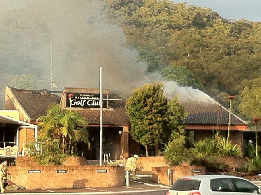 BLAZE: Fire crews attending a fire at Nelson Bay Golf Club on Sunday morning. Picture: Twitter.