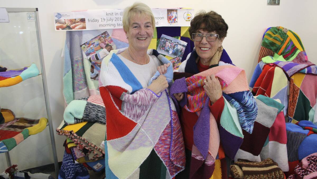 WARM HEARTED: Pauline Howes and Colleen Johnson support the Wraps with Love Project. 