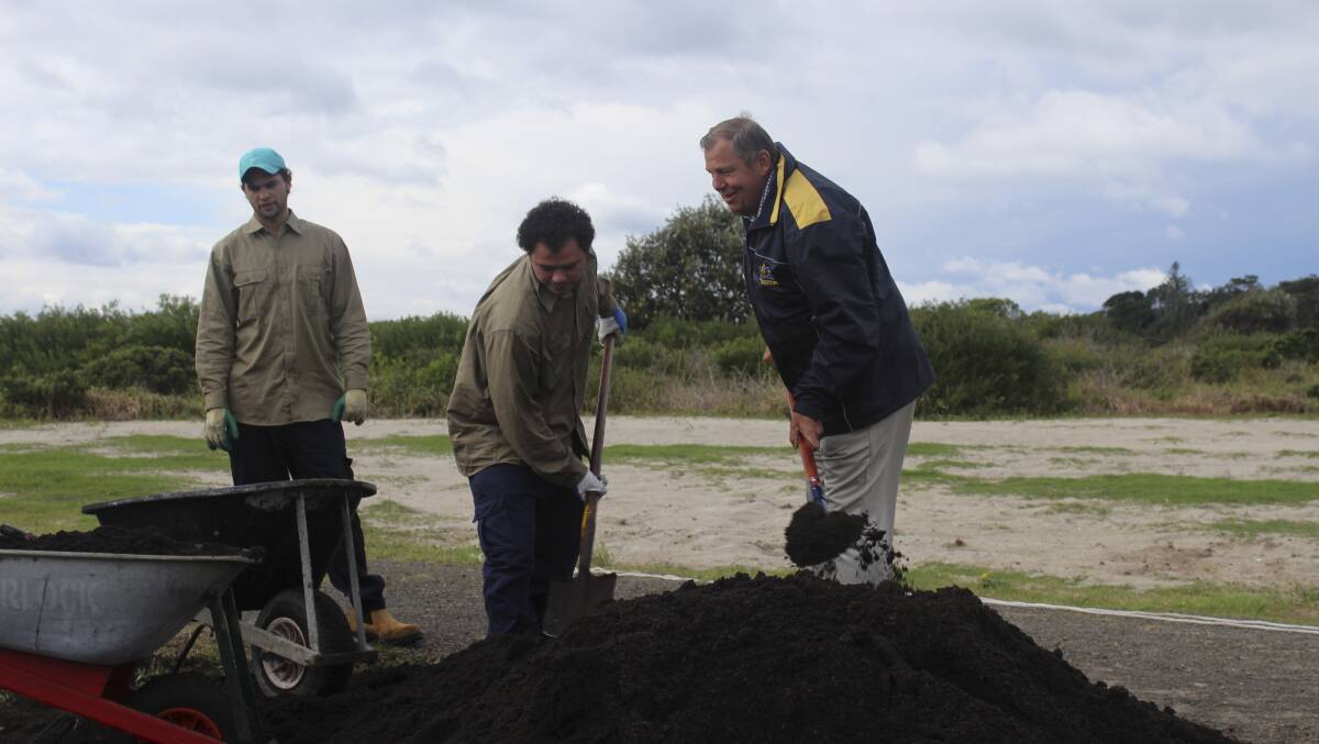 DIGGING DEEP:  Paterson MP Bob Baldwin gets his hands dirty with the Green Army team at Forster.