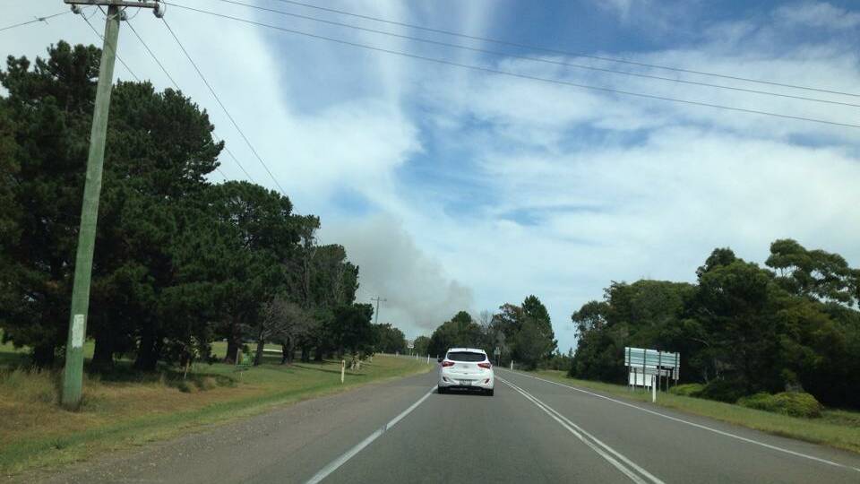 Wet conditions combined with a sea breeze is causing smokey conditions at Salt Ash. Picture of the smoke caused by the Rookes Road, Salt Ash grass fire by Tony Hatcher/Facebook.