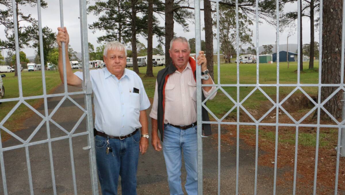 DEDICATION: Eric Saville and Gary Gooch, at Bulahdelah Showground memorial gates.  Picture: Stephen Wark