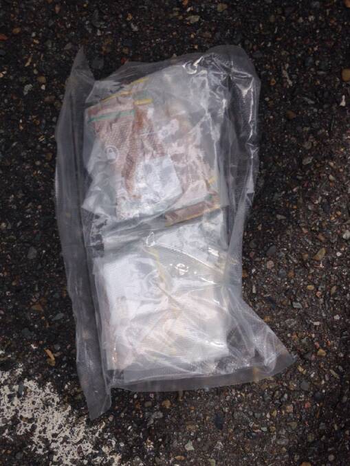 SEIZED: A plastic bag allegedly containing prohibited drugs that was found during raids at Raymond Terrace.