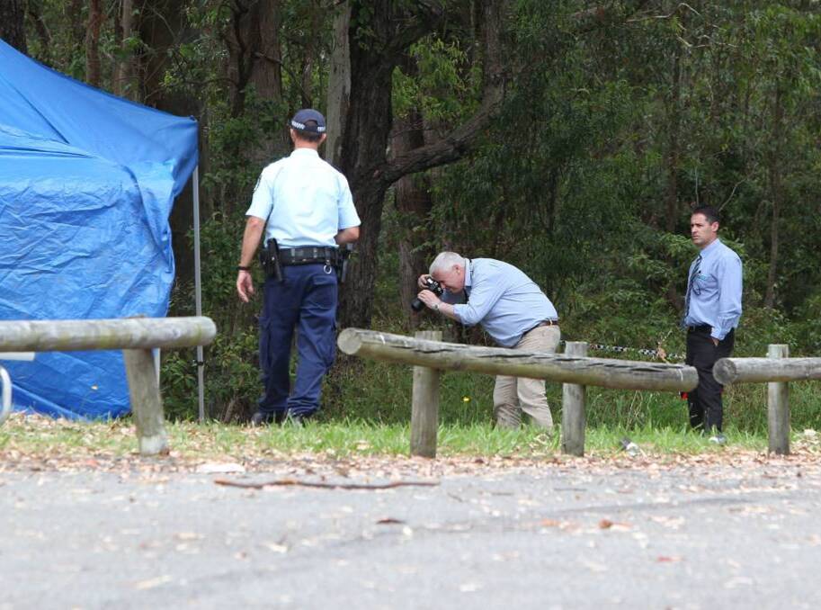 INVESTIGATION: Police at the scene where Renee Mitchell's body was discovered in Bangalay Reserve at Windale in November, 2014. Picture: Phil Hearne
