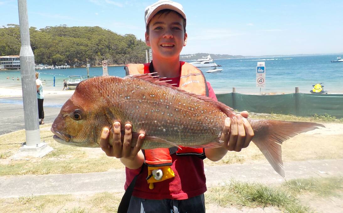 CATCH: Fourteen-year-old champion, Henry Petterson, with his 4.5kg Broughton Island snapper. Excellent reports have been rolling in from the shallow reefs that surround the island and the deep water reefs north to Seal Rocks. 
