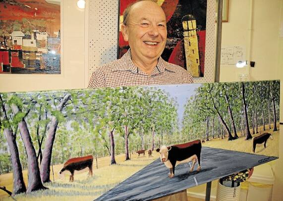 VIVID: Port Stephens Art Prize winner Kevin Griffey with his winning work, Road Block, which was described as "bursting with personality" by judge Brad Franks. Picture: Ellie-Marie Watts