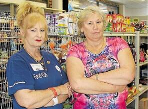 HARD TIMES: Glen Marlow and Joyce Barrett are upset by the closure of Food 4 Life. Picture: Stephen Wark