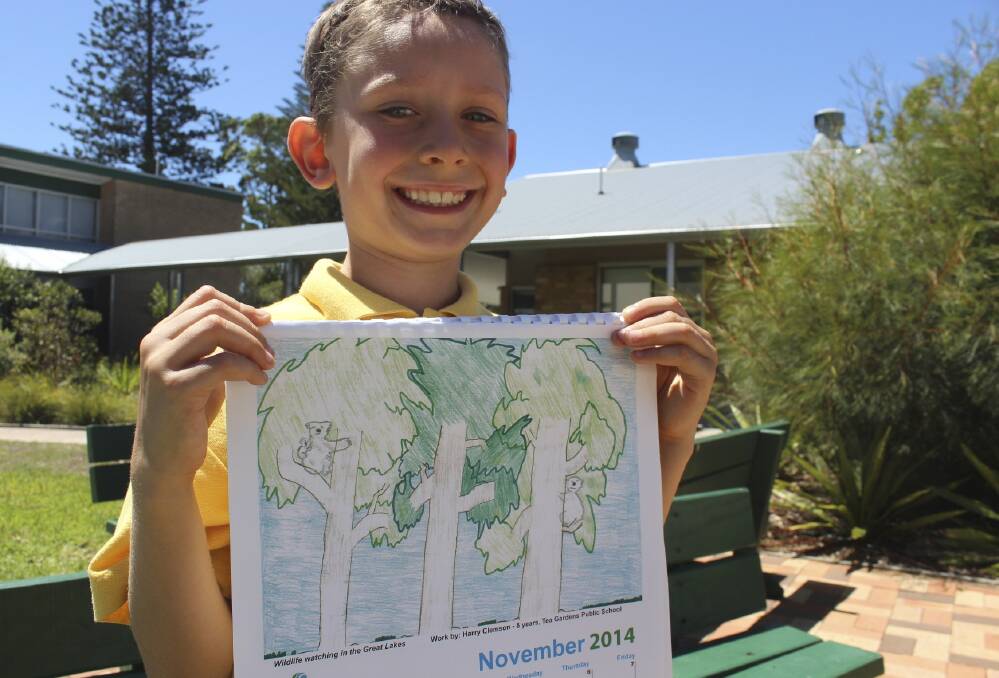 ARTIST: Eight-year-old Harry Clemson, of Tea Gardens Public School, with his winning picture. Picture: Nathalie Craig