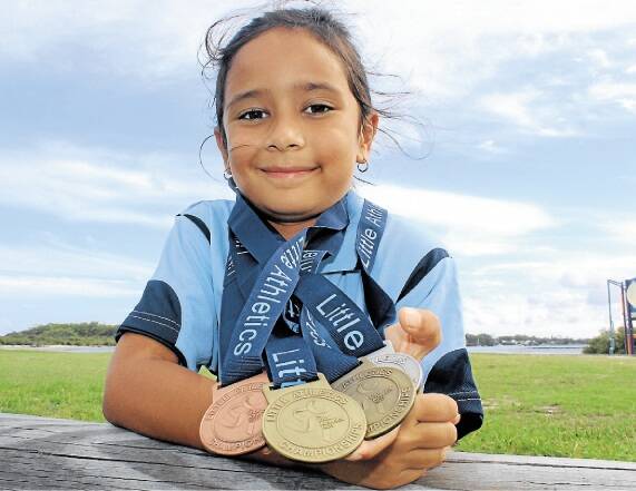 WINNER: Keira McGregor, 7, took home four medals at the Regional Little Athletics Championships. Picture: Nathalie Craig