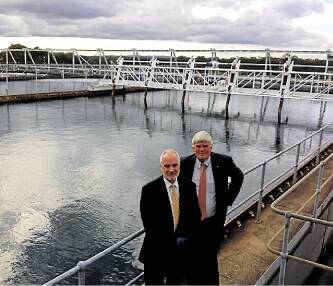 THIRST FOR IMPROVEMENT: The managing director of Hunter Water, Kim Wood, with Port Stephens MP Craig Baumann at the Grahamstown Hunter Water Treatment Plant at Tomago. Picture: Sarah Price