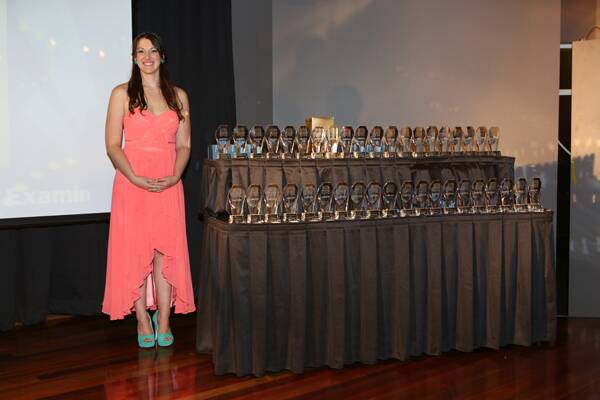 The Examiner's Samantha Newman with the awards to be handed out.