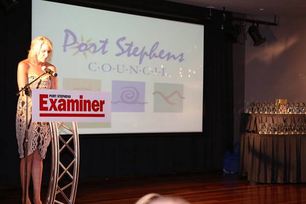 Examiner editor Anna Wolf giving the introductory speech at this year's awards.