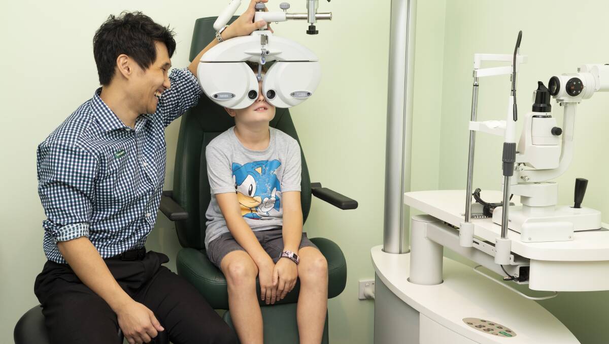 A Specsavers optometrist conducting an eye test on a child. Picture supplied