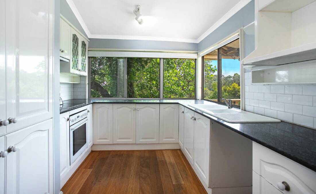 The kitchen overlooks the gardens. Picture supplied