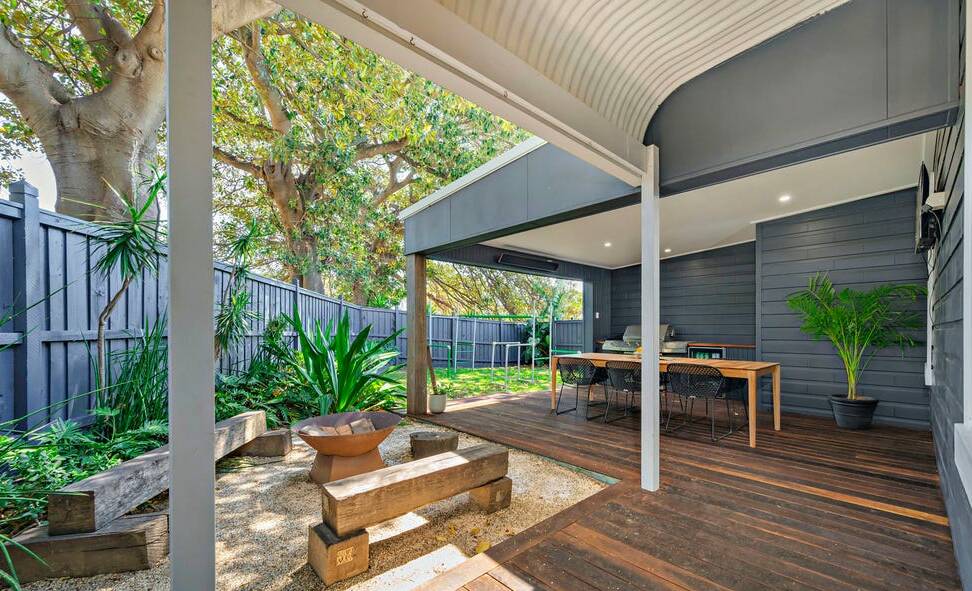 The alfresco area included a wrap-around deck with a built-in barbecue, a fire pit, strip heater and wine fridge. Picture supplied