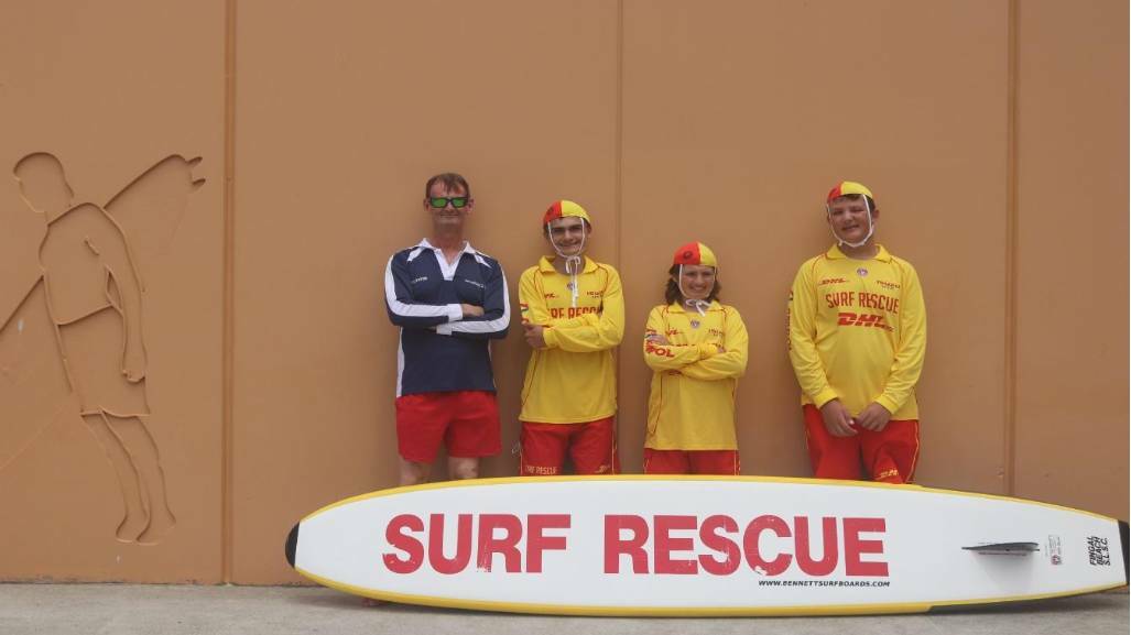 Steve Westcott (left) was named Surf Life Saving Australia (SLSA) Assessor of the Year. Steve if pictured with three students he mentored last year. 
