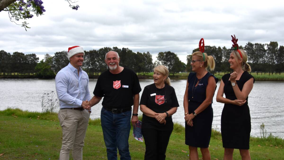 Dowling Real Estate and the Salvation Army join forces to make Christmas a bit brighter for Port Stephens families feeling the pinch. Picture by Laura Rumbel