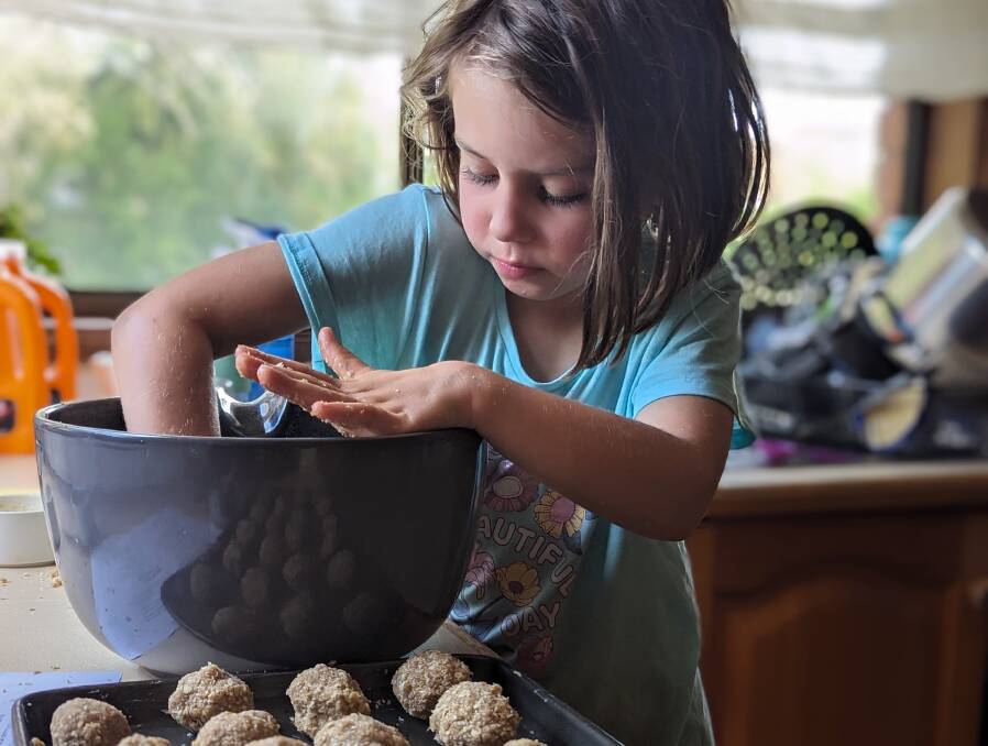 Elky in the process of making her homemade Anzac biscuits. Picture supplied
