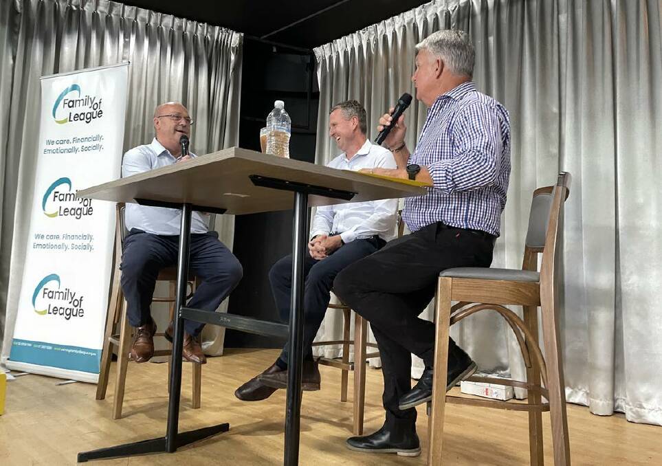 Richard Jones, Mark Hughes and Charlie Haggett share tall tales and true on stage at the Family of League lunch at Soldiers Point Bowling Club. Picture by Michael Hartshorn
