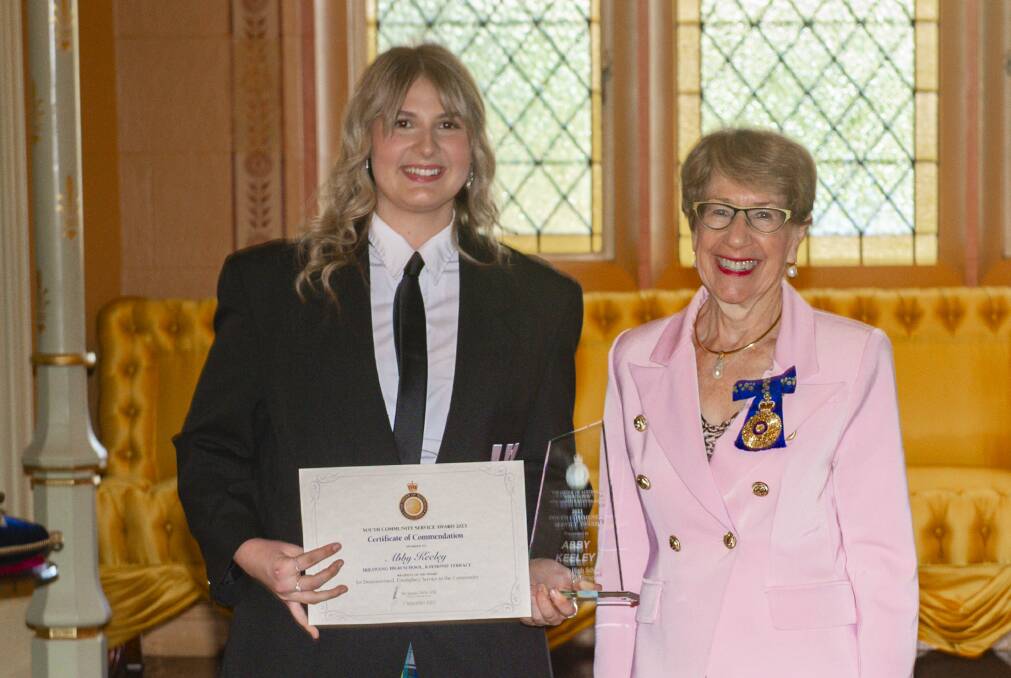 Irrawang High year 11 student Abby Keeley and NSW Governor Margaret Beazley after she was presented with Youth Community Service Award
