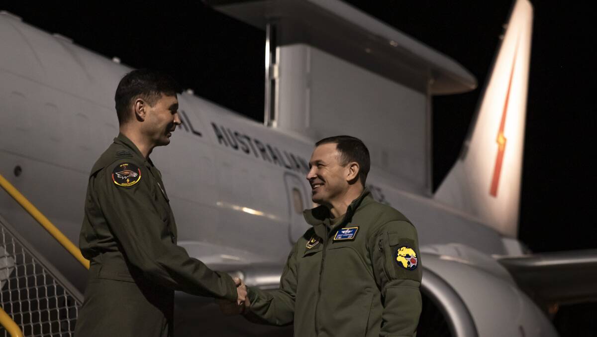 Lieutenant General John Lamontagne, Deputy Commander US Air Forces in Europe - Air Forces Africa (right), with Wing Commander Darrin Lindsay, Commander E7 Detachment prior to boarding an E-7A Wedgetail deployed on Operation Kudu in Germany. Picture by Corporal Nicole Dorrett
