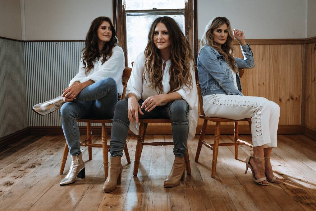 MOTHER SHIP: The McClymonts, from left, Mollie, Brooke and Samantha are juggling parenthood and music.