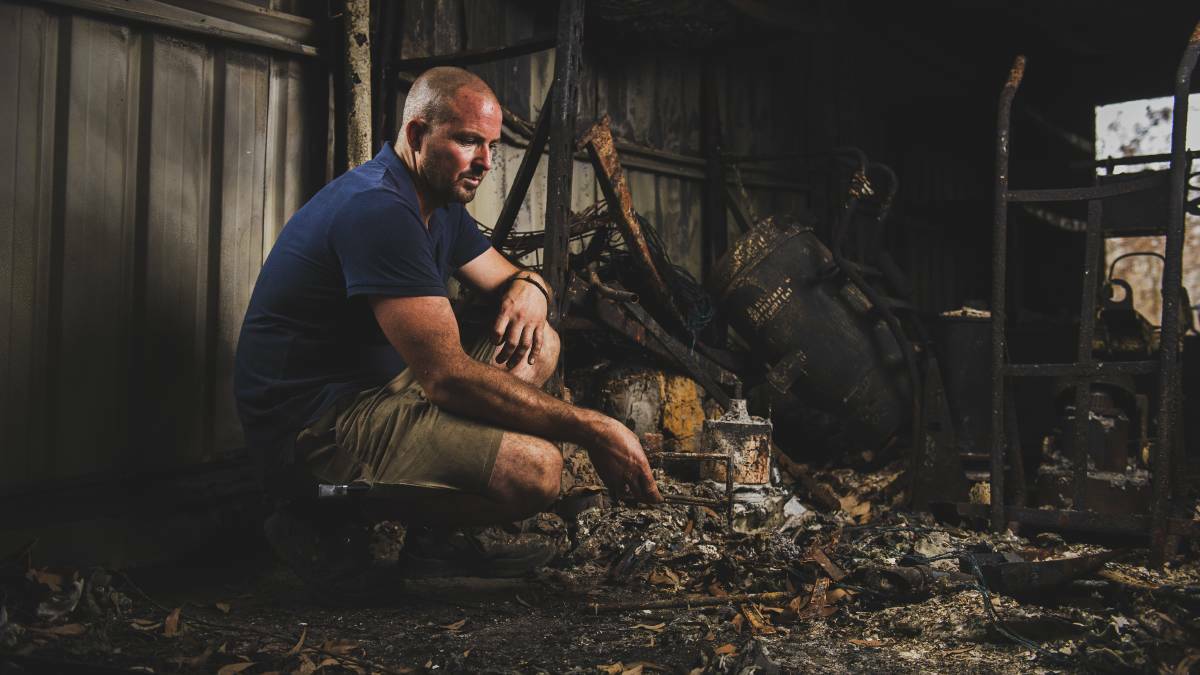 Nathan Love in his destroyed home. Photo: Dion Georgopoulos
