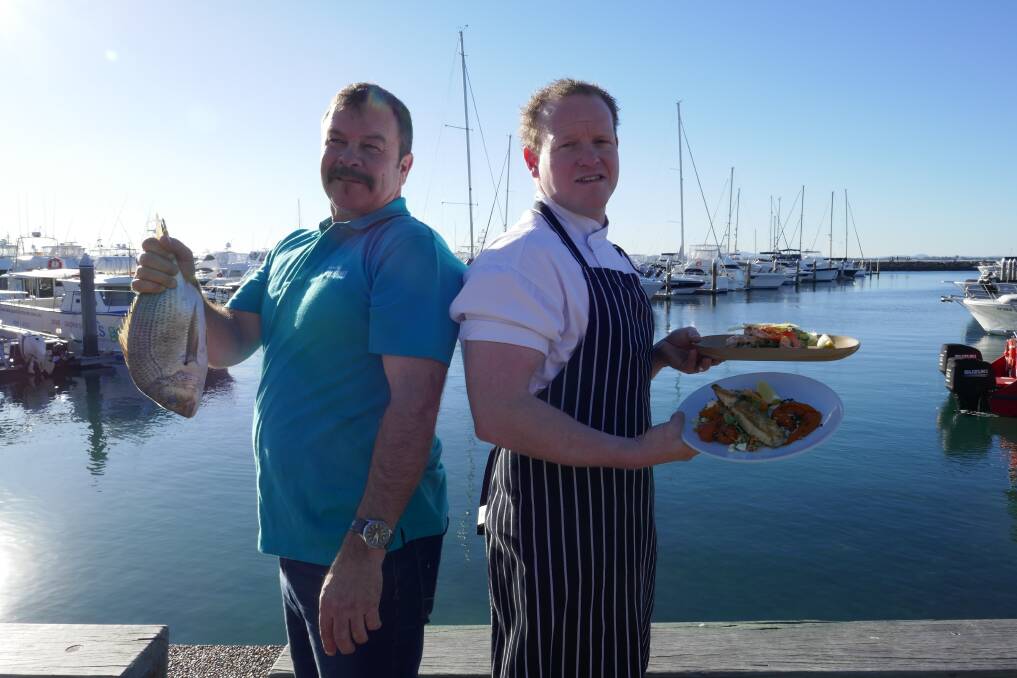 HOOKED: Darren Hearn, left, from the Nelson Bay Fish Market and Ben Way from the Little Beach Boathouse at the launch of Love Sea Food Tastes Port Stephens.