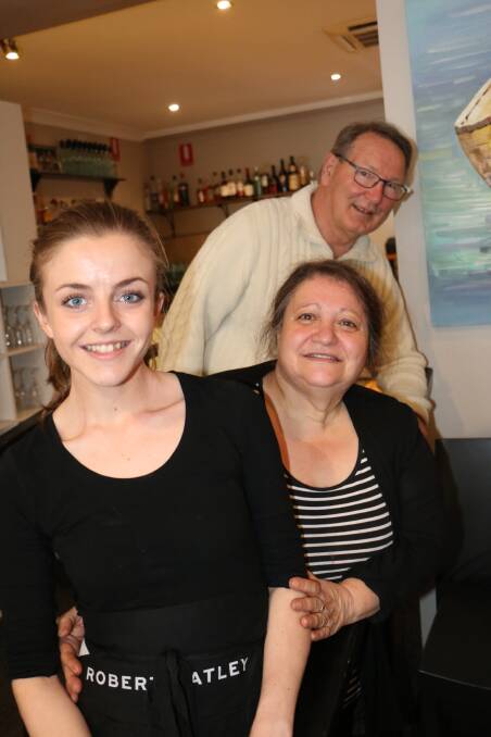 APPRENTICE: Pheobe Reeder with Sienna's owner Anna Lauricella and the chamber's Peter Clough.