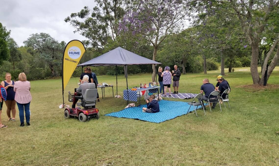 COMING TOGETHER: Hume Community Housing hosted a pop-up information tent and barbecue on November 30 to encourage residents to be bushfire ready.