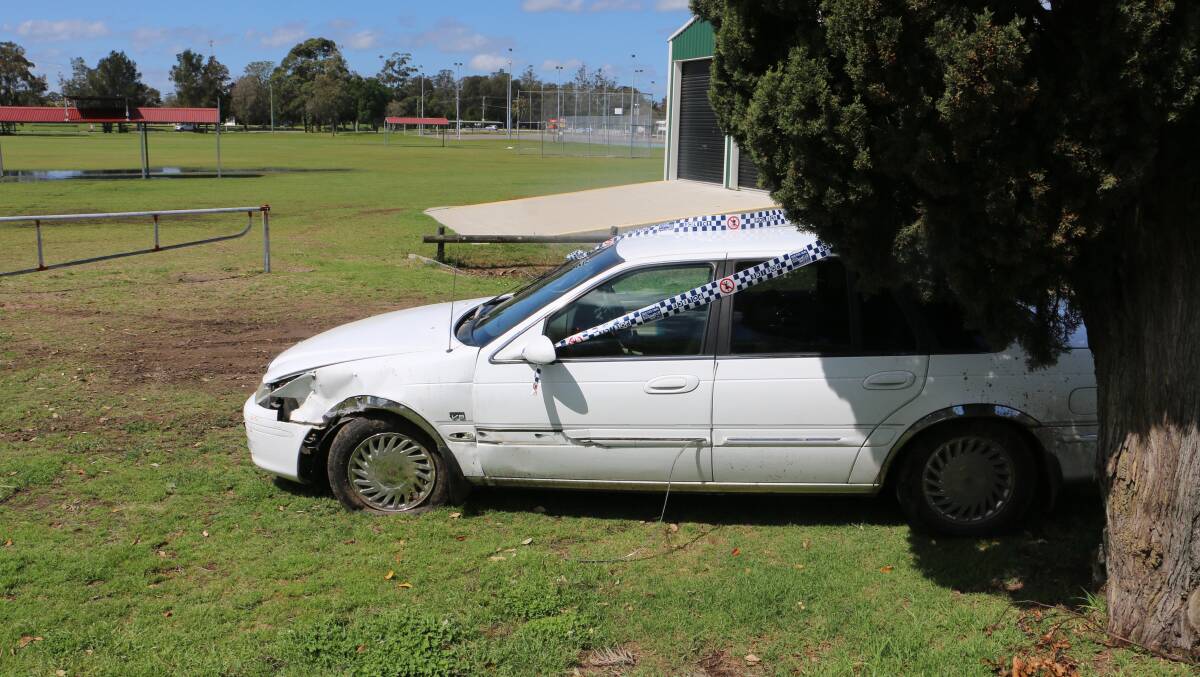 Police tape around the abandoned car in Raymond Terrace.