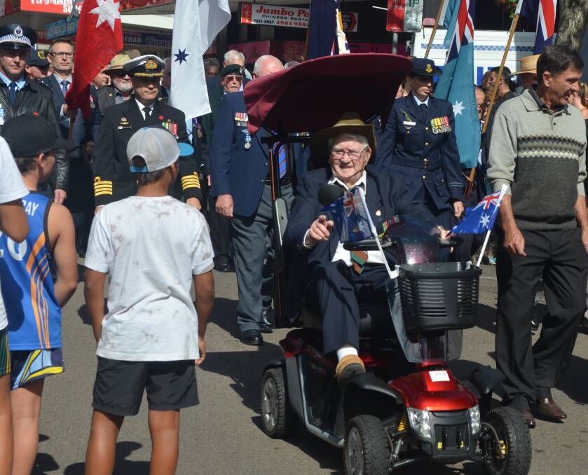 IDENTITY: World War II veteran Bill Fuller was farewelled by family and friends in Nelson Bay. He's pictured leading the Anzac Day march in 2017. Picture: Sam Norris