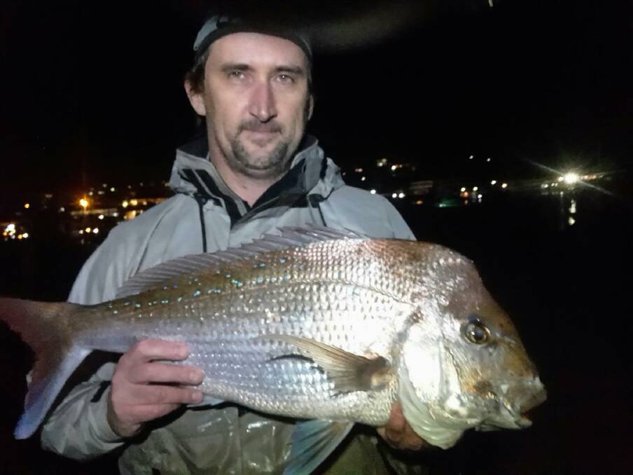 SURPISE: Petar Perekovic with his cracker 4.8kg snapper caught off the breakwall.