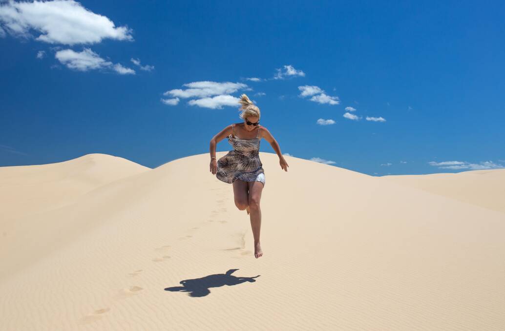 DUNE DANCE: Taken in the sand dunes at Port Stephens, Ashleigh had just returned from more than 2 years living in Northern England, she loves being home in beautiful sunny Newcastle, according to her mother Suella Smith who took this image. 