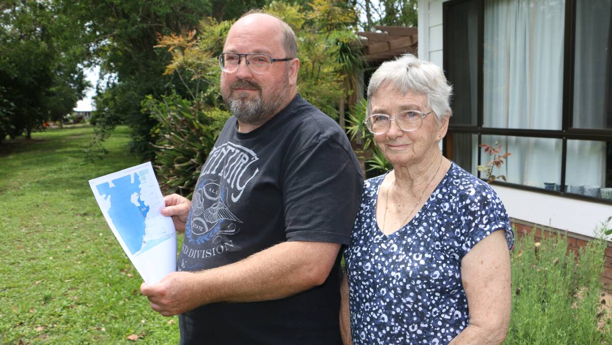 IMPACTED: Russel Lunney with his mother Dr Ruth Lunney at the Medowie property. Mr Lunney raised concerns about Campvale Drain.