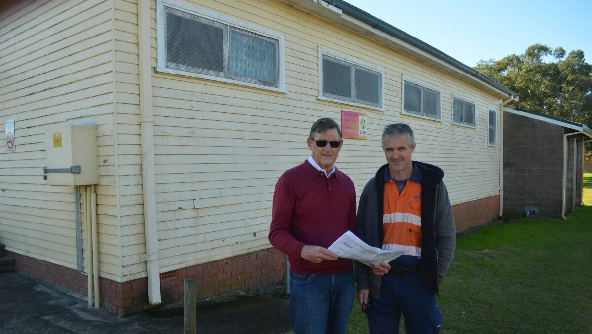 TAKING SHAPE: Port Stephens Council has approved revised plans for a new Fern Bay Hall. Pictured are Cr Geoff Dingle and the hall’s booking officer Tony Tindall. Picture: Sam Norris