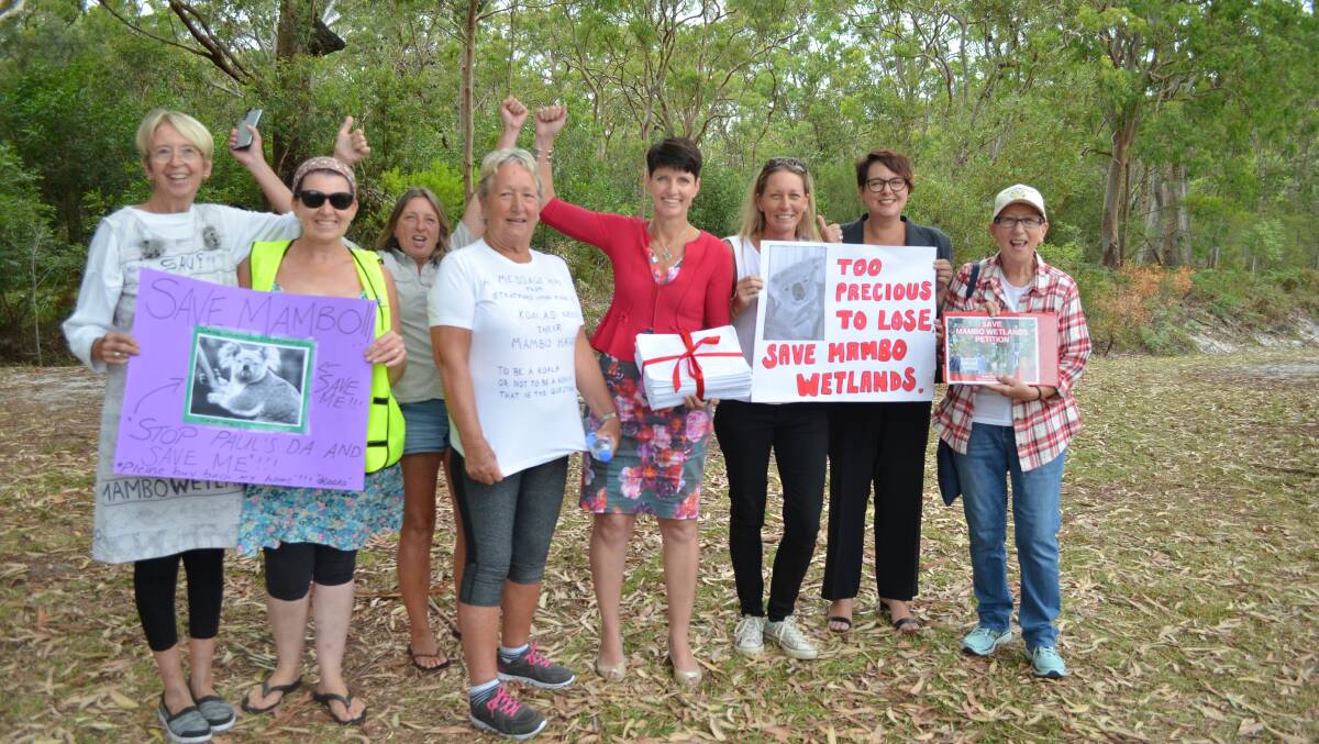PREMATURE: Last week Port Stephens MP Kate Washington (centre) celebrated the collection of 10,000 signatures. This week she slammed Liberals for "committing to investigate" a buy-back. 