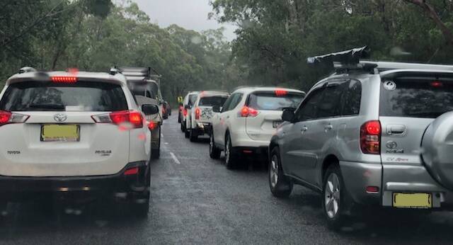 GO SLOW: It was heavy going southbound on Nelson Bay Road shortly before noon on Monday.