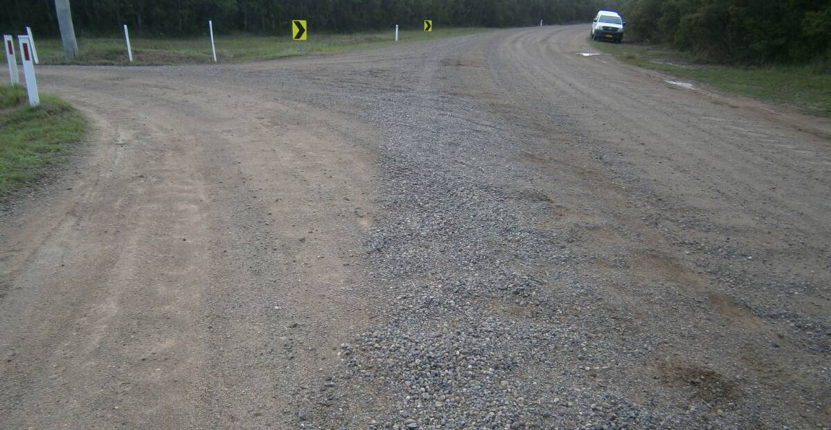 DANGEROUS: Potholed, corrugated and littered with loose gravel, residents say the corner of Davis Road is particularly dangerous. Picture: Supplied