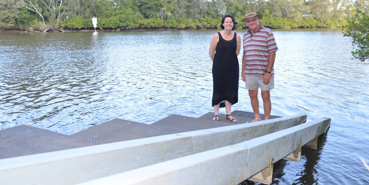 COME ON DOWN: Seaham Park and Wetlands Committee vice chairwoman Kim Hannaway and chairman Robert Adams at the recently installed canoe launch which provides easy entry to the Williams River. Picture: Sam Norris