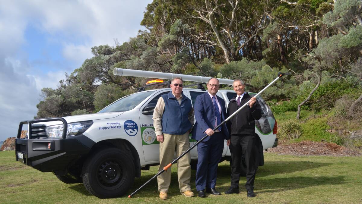 FULLY EQUIPPED: Port Stephens Koalas vice president Ron Land with Hunter Water managing director Jim Bentley and Port Stephens Council general manager Wayne Wallis. Picture: Sam Norris